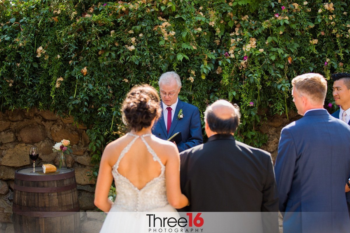 Father gives his daughter away to the Groom