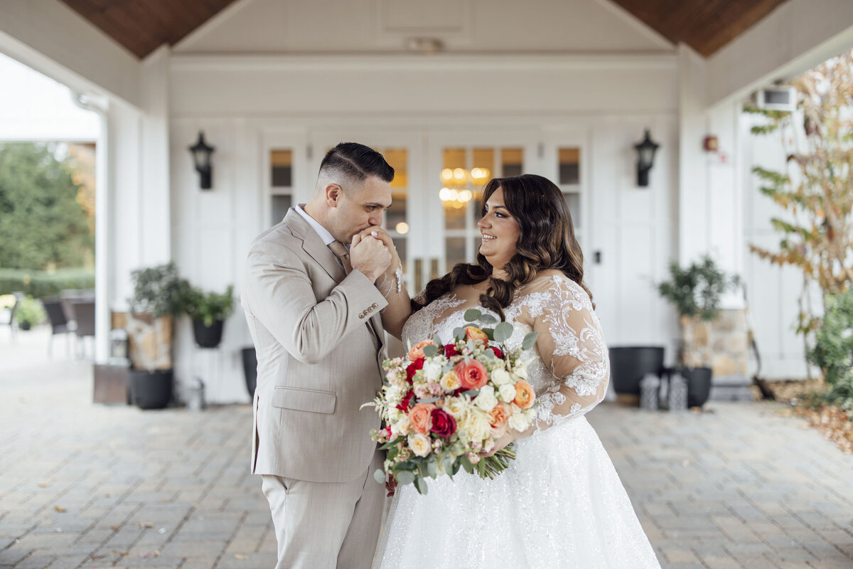 The Farmhouse Wedding | Groom Kissing Bride’s Hand | Hampton, New Jersey Photography