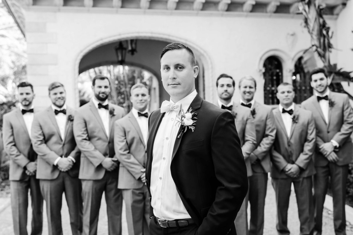 Groom and his Groomsmen in classic black and white portraiture outside of the Powel Crosley Estate in Sarasota, FL