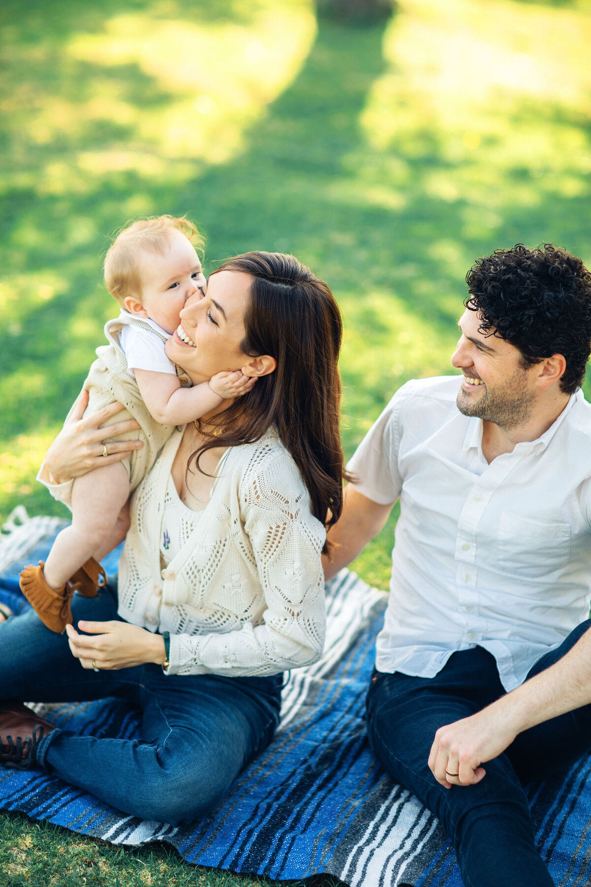 Family Portrait Photo Of Baby Kissing Her Mother On The Cheeks Los Angeles