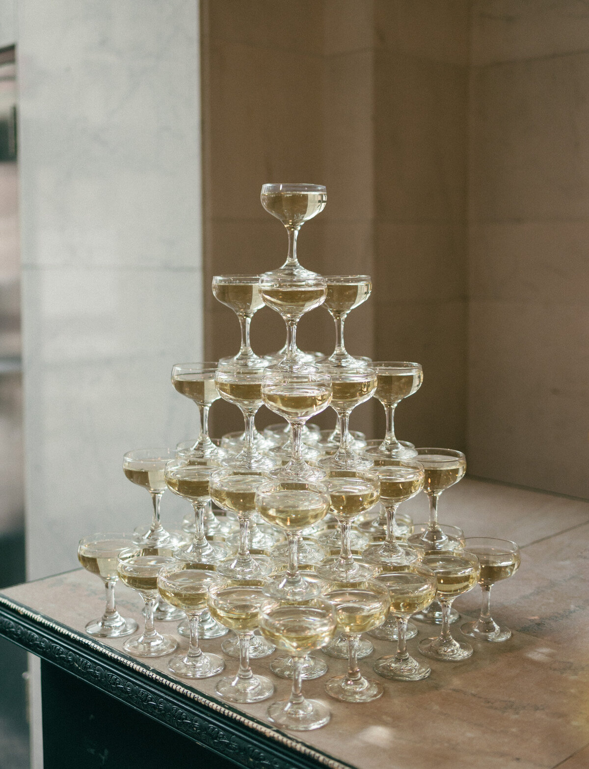 a champagne tower at a unique Detroit wedding venue, State Savings Bank