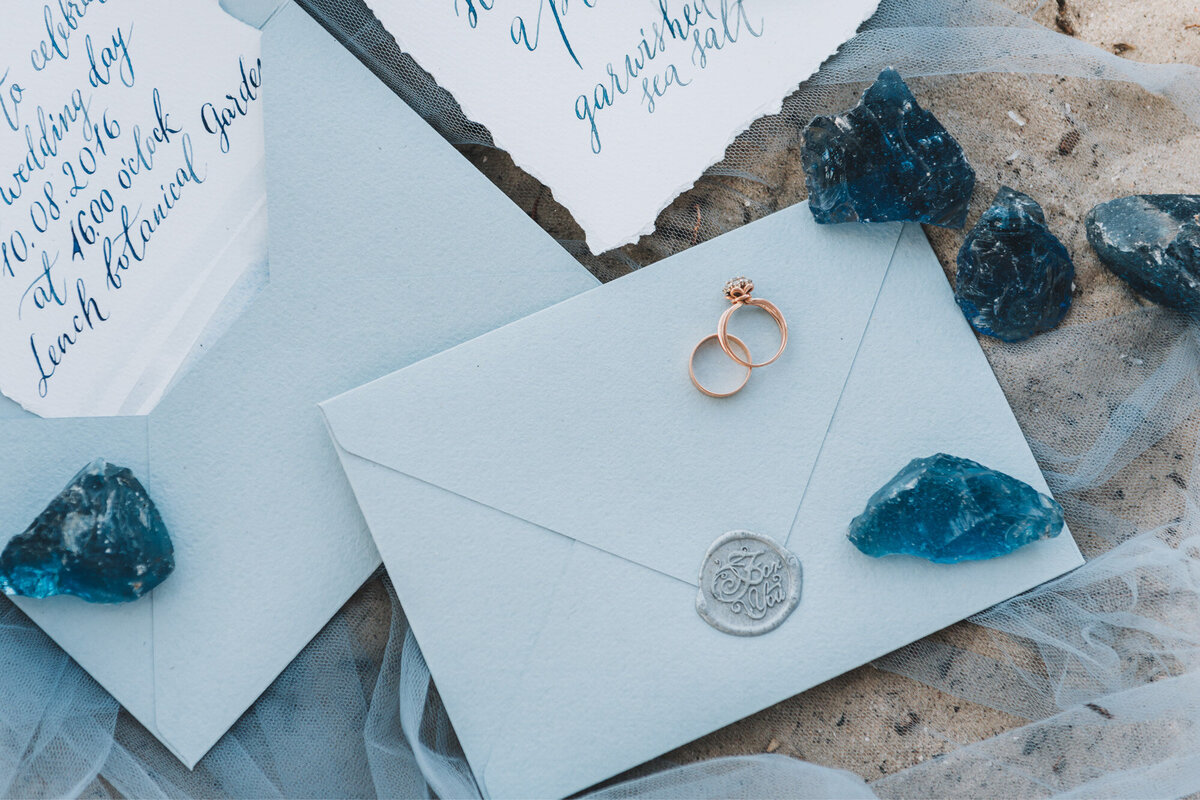 Wedding invitation details with rings