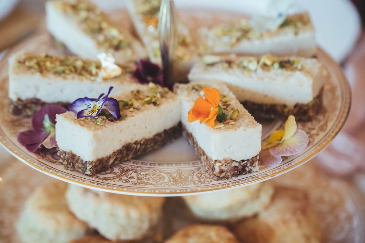 Cakes on middle of the cake stand for afternoon tea