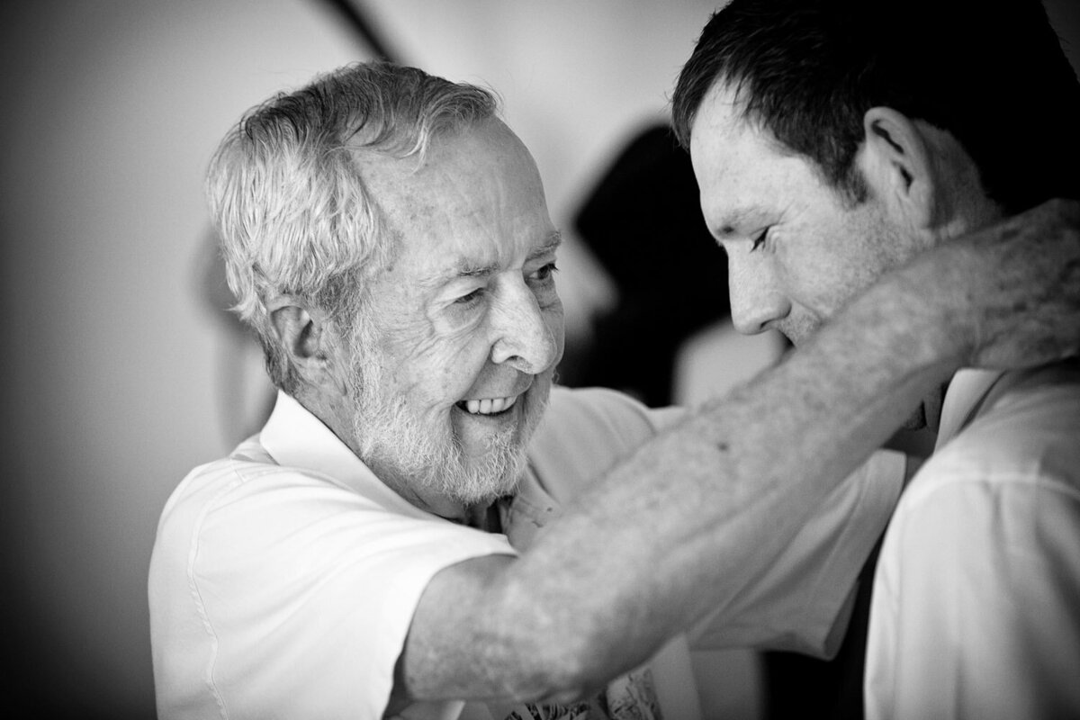 father and son getting ready wedding image in rural Queensland