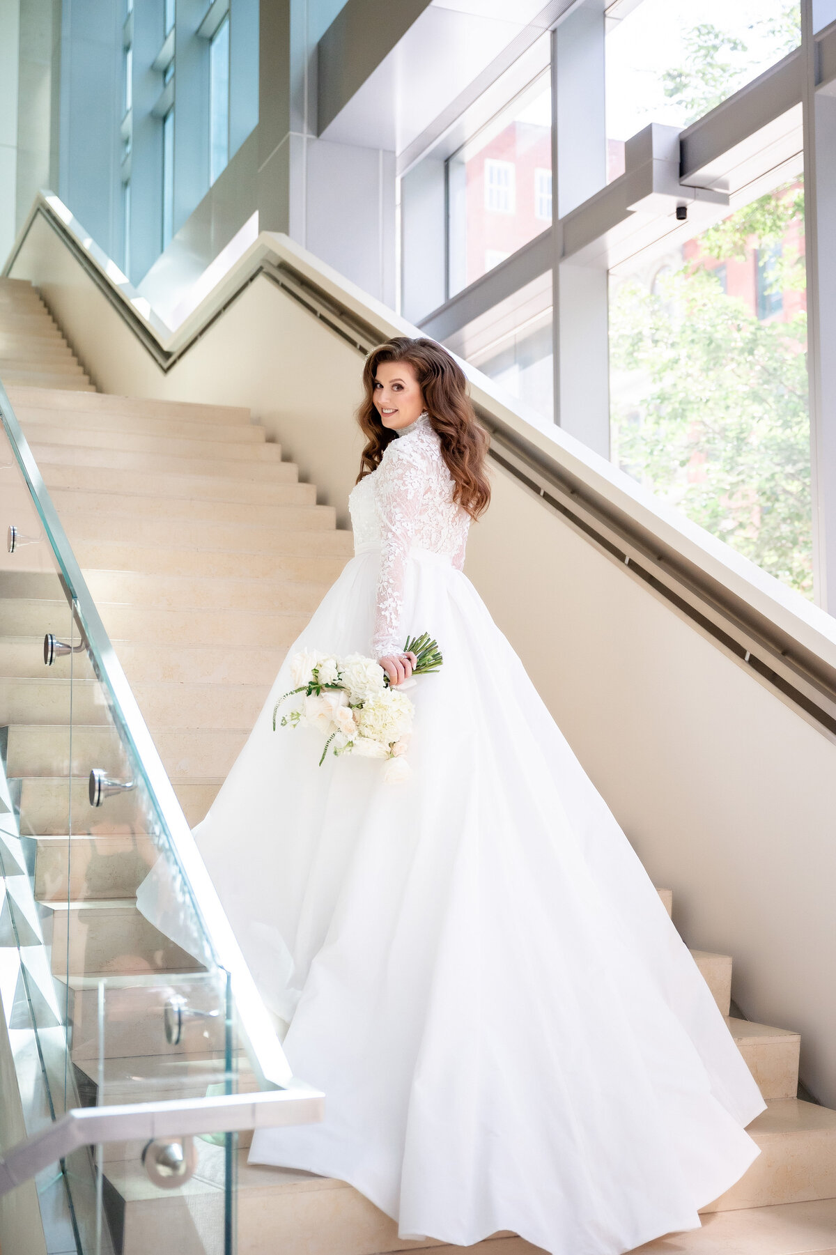 beautiful bride on steps at fairmont hotel