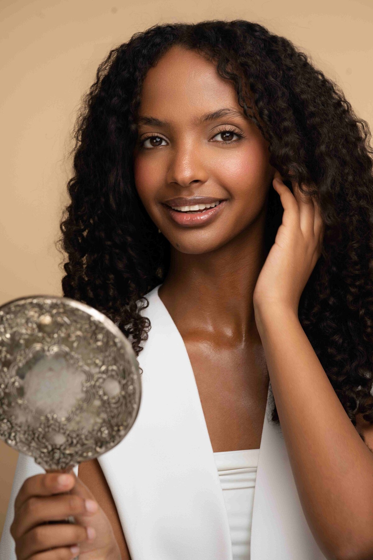 model posing with mirror