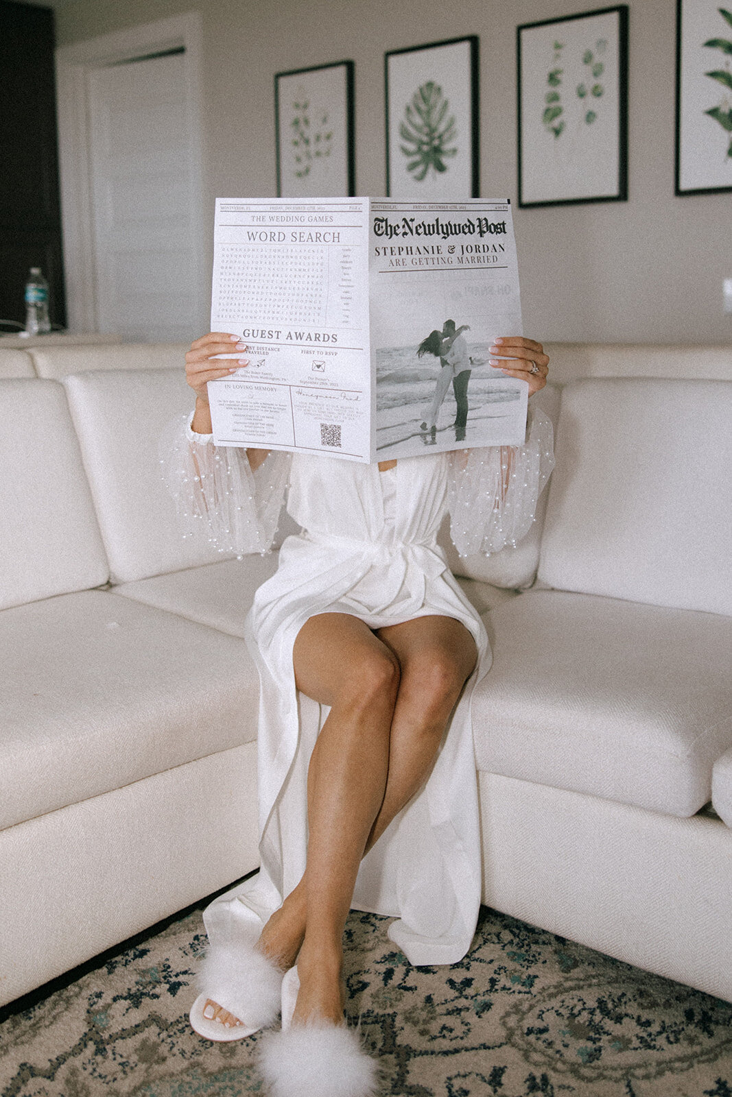 bride with newspaper at bella collina weddings & events​