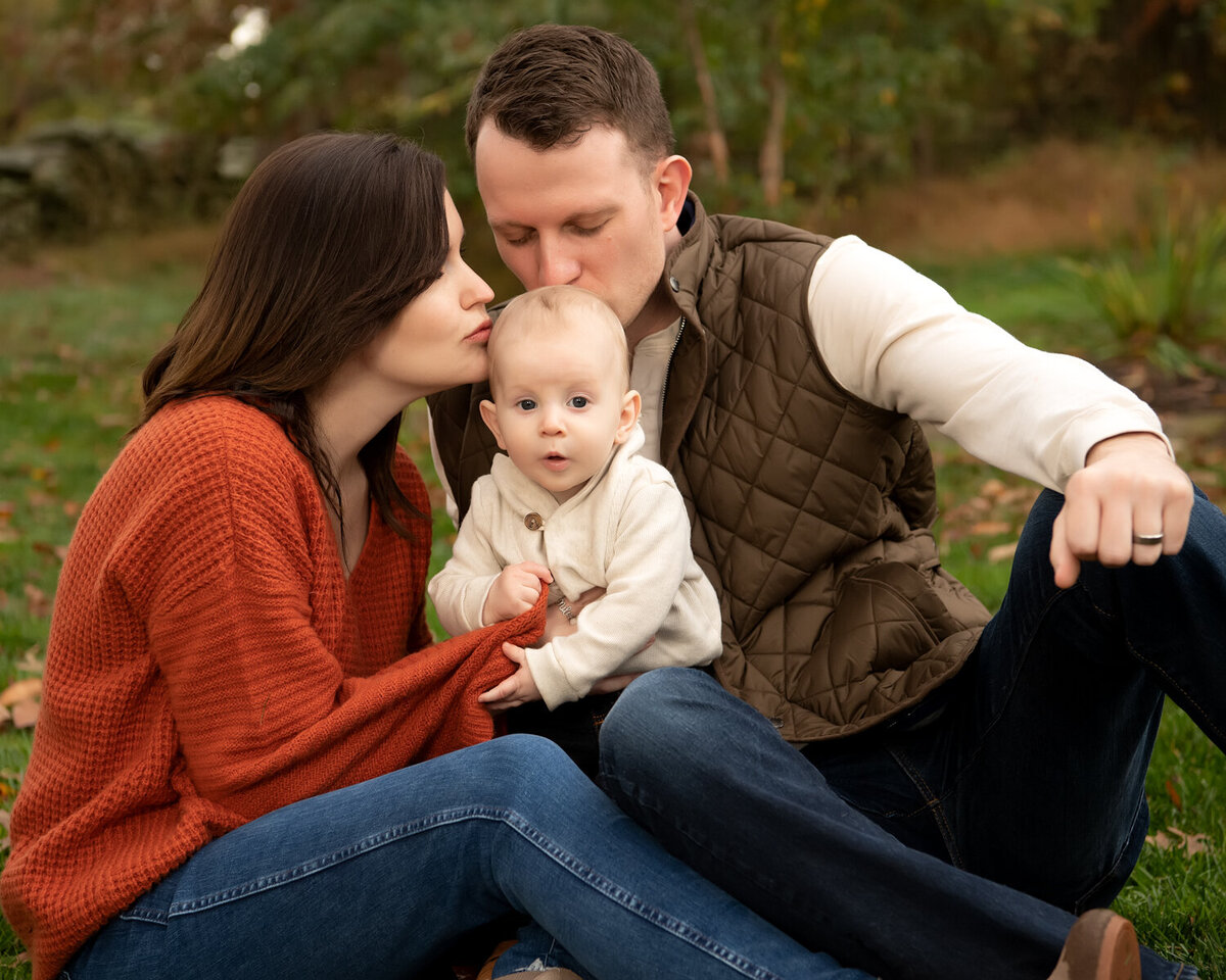 baby with parents family photo