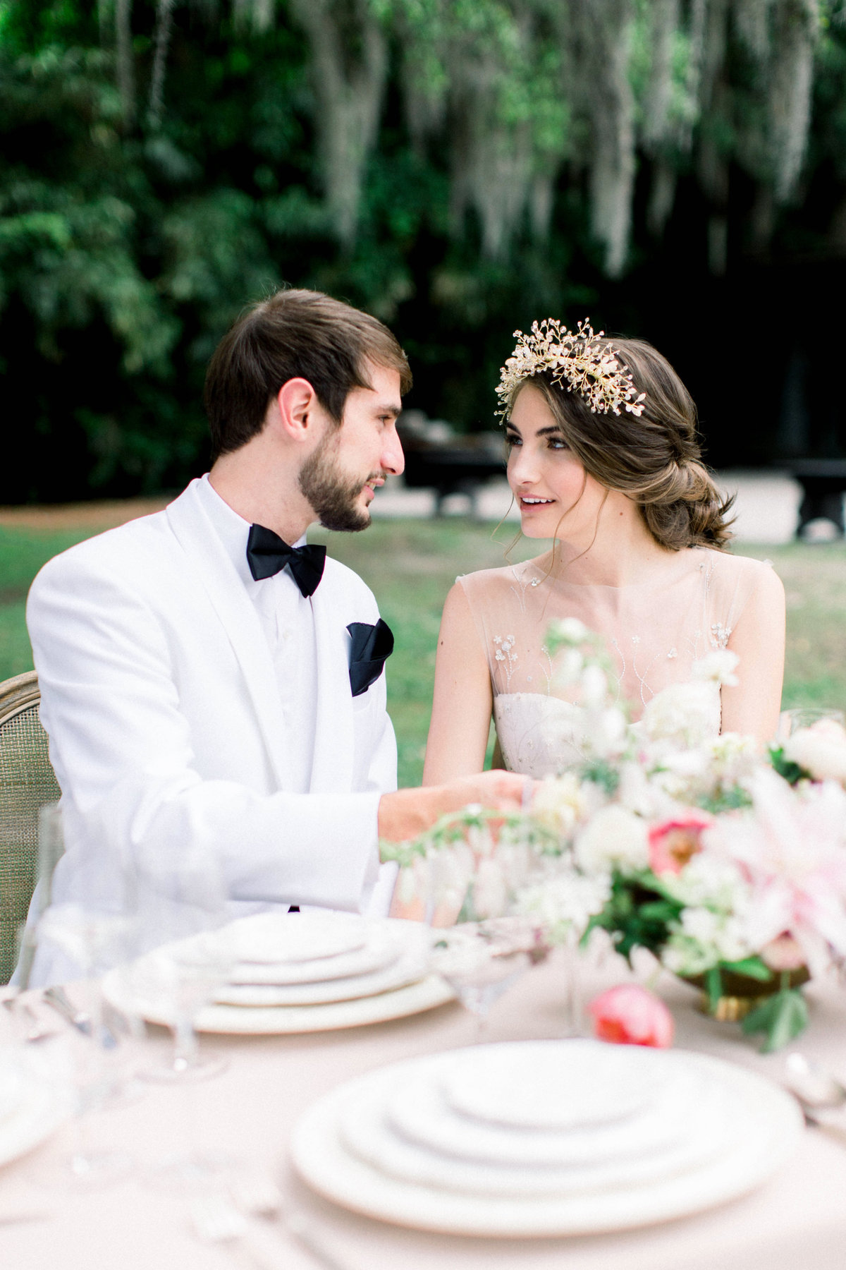 Romantic floral centerpiece for charleston bride and groom at Magnolia Plantation