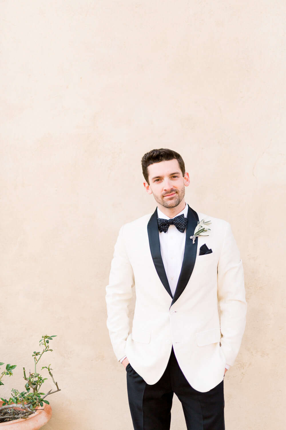 Black and White Groom's suit