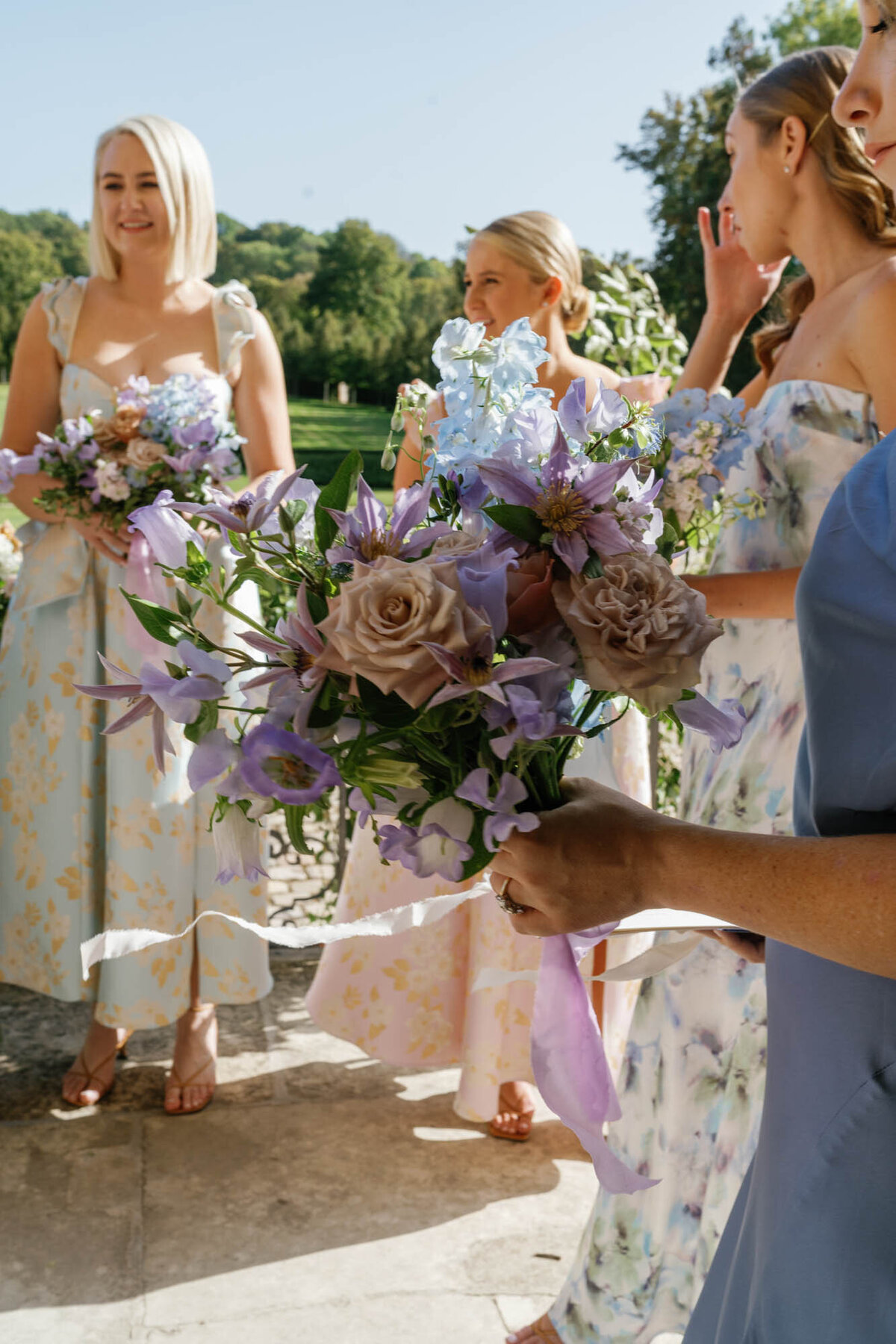 a lilac bride's maid bouquet
