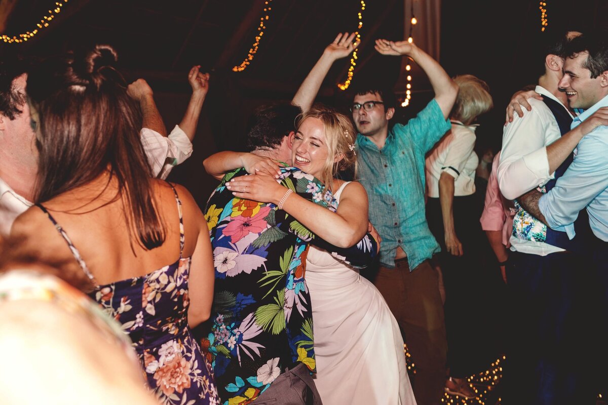 Guests dancing at reception at Blue Venado Seaside Riviera Maya wedding