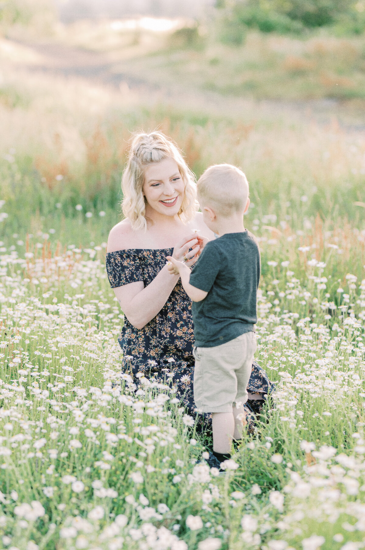 Maternity in dark floral dress with son-1