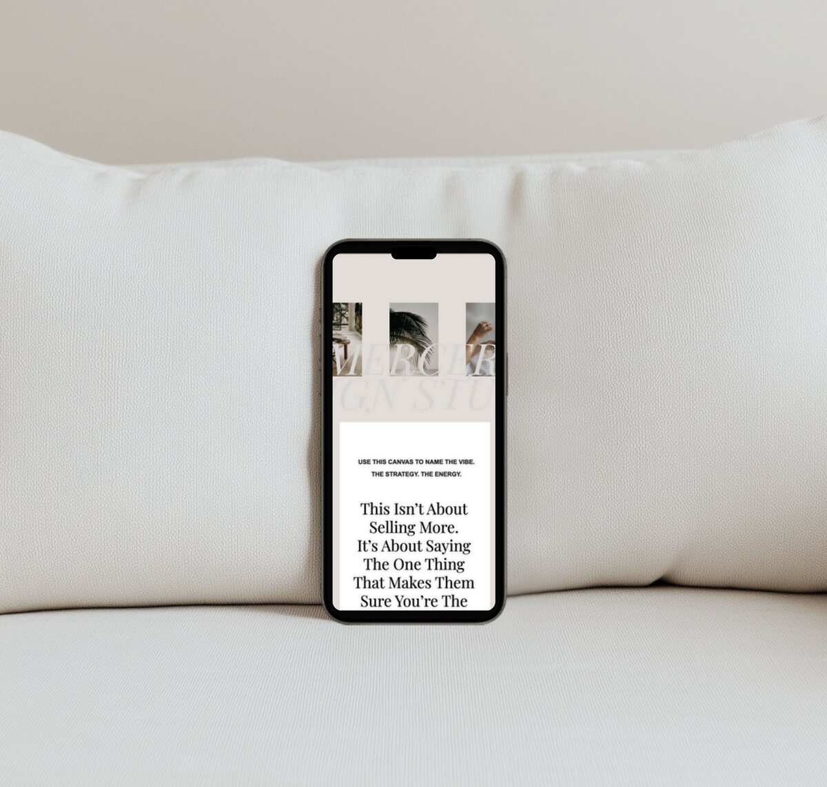 Mercer luxury mobile sales page template mockup on iPhone with warm sofa backdrop — high‑end ShowIt sales page design.