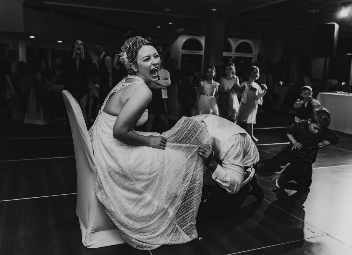 dancing bride laughing on wedding day (1 of 1)