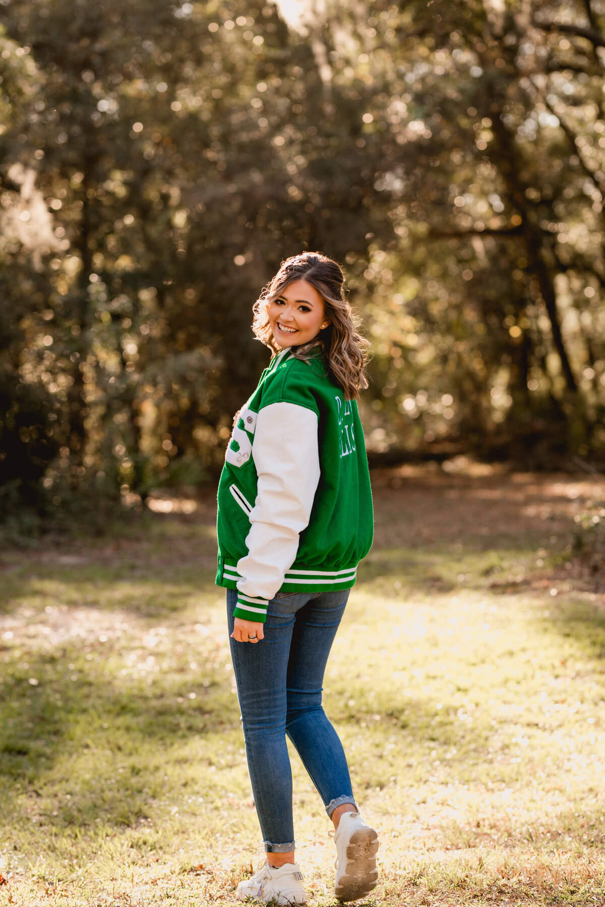 Senior pictures with letterman jacket in South Georgia