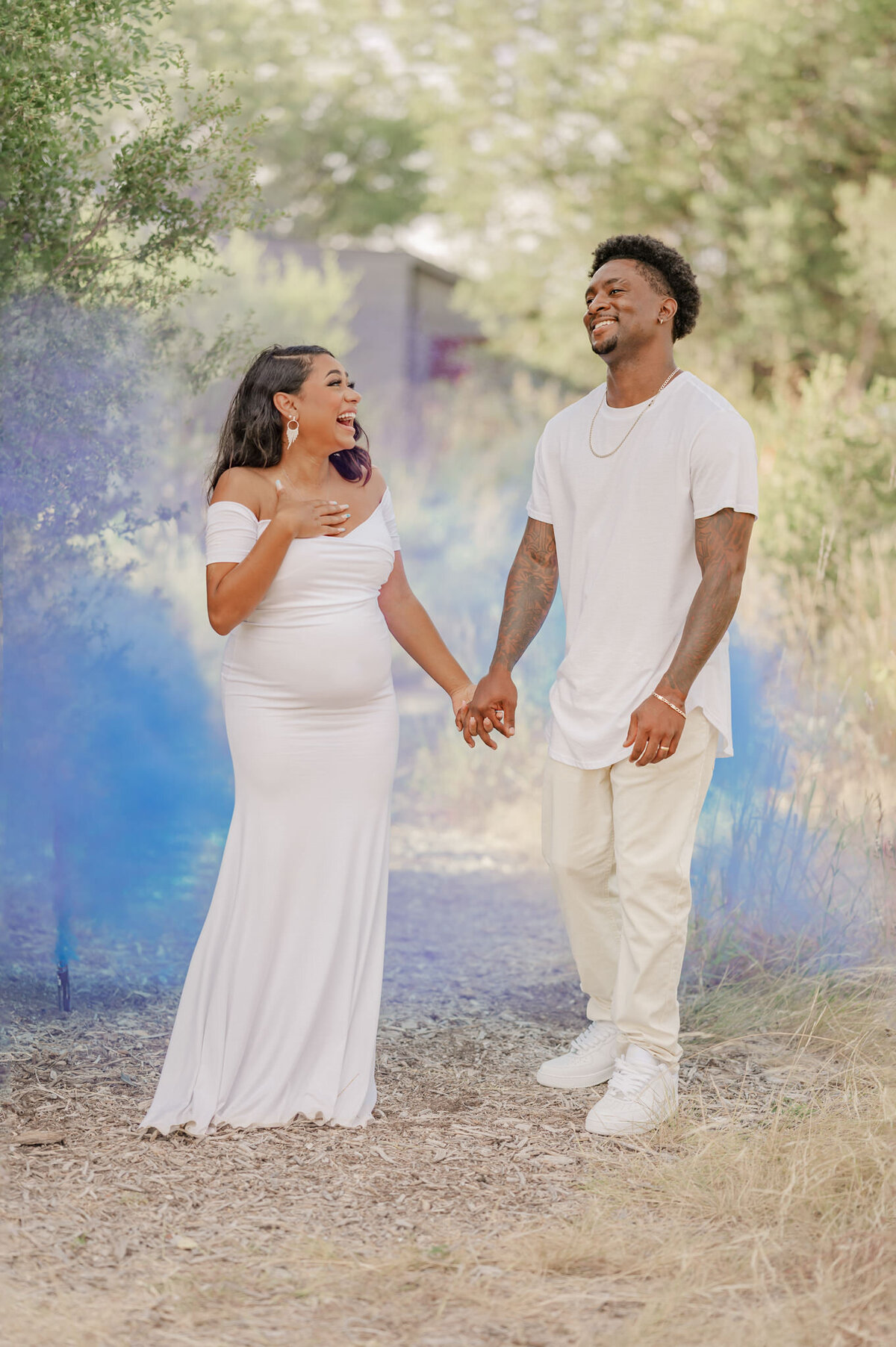 San Antonio gender reveal pictures of a couple finding out they're having a boy, by Cassey Golden Photography.