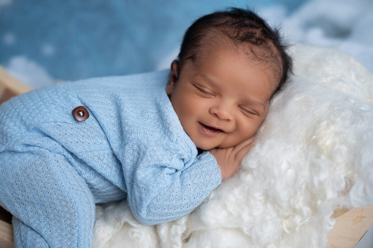08 Charlotte newborn photography smiling boy