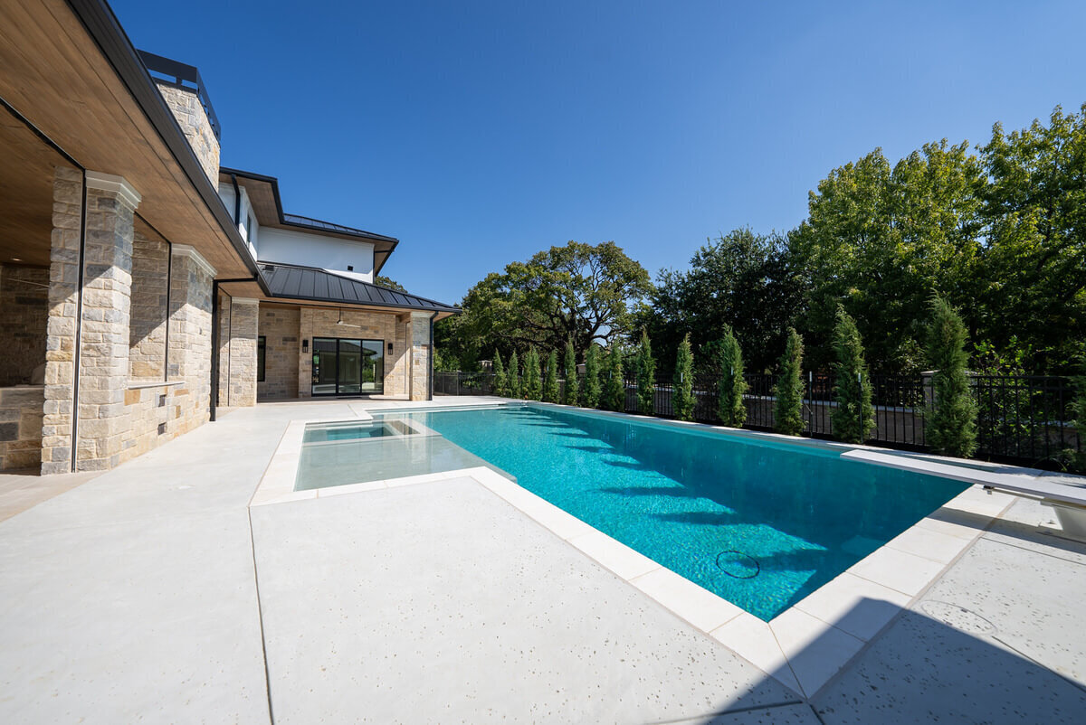 Custom home with luxurious swimming pool in the backyard