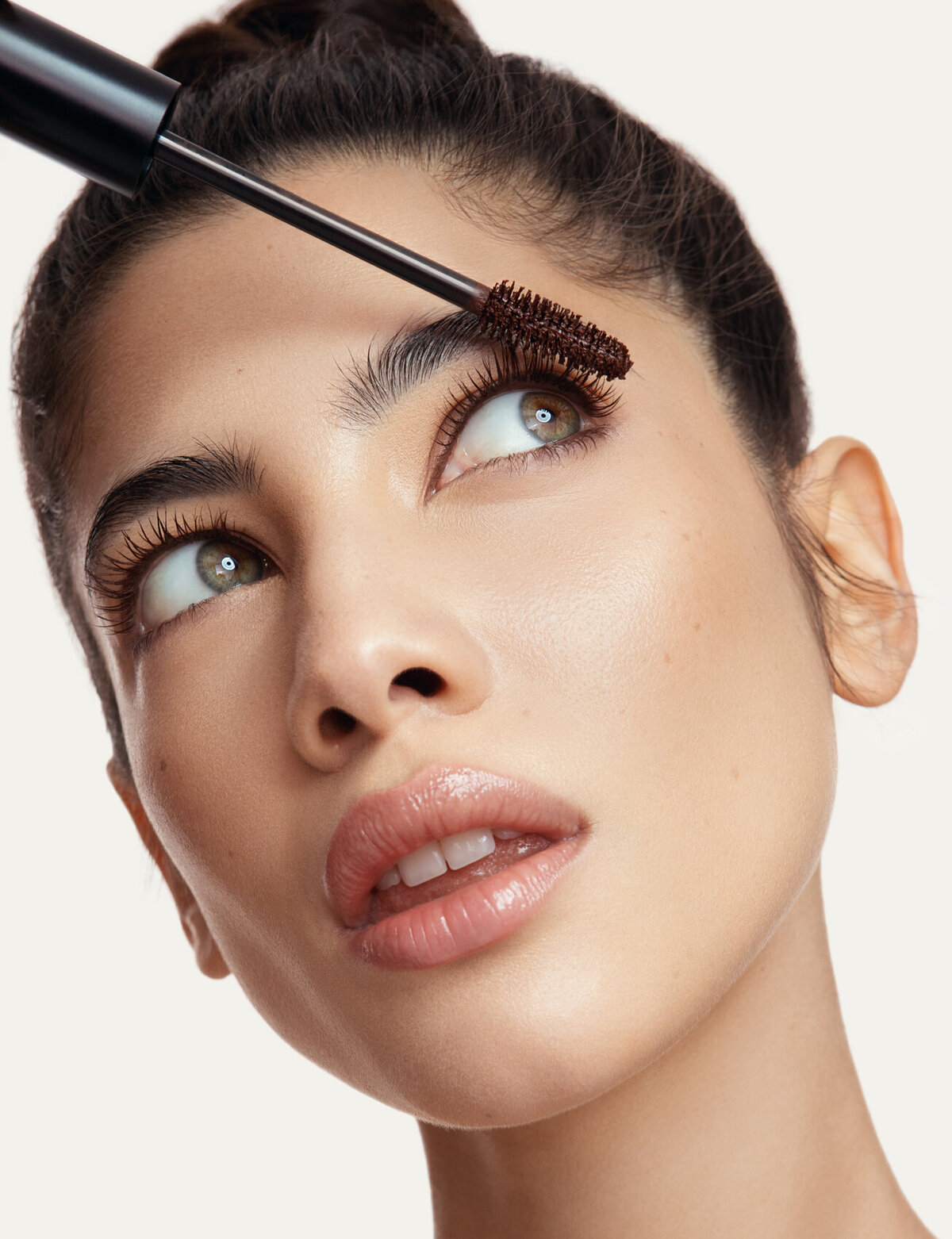 Close-up beauty portrait of Apoorva wearing bold makeup, captured for a YSL beauty campaign by Ylva Erevall.