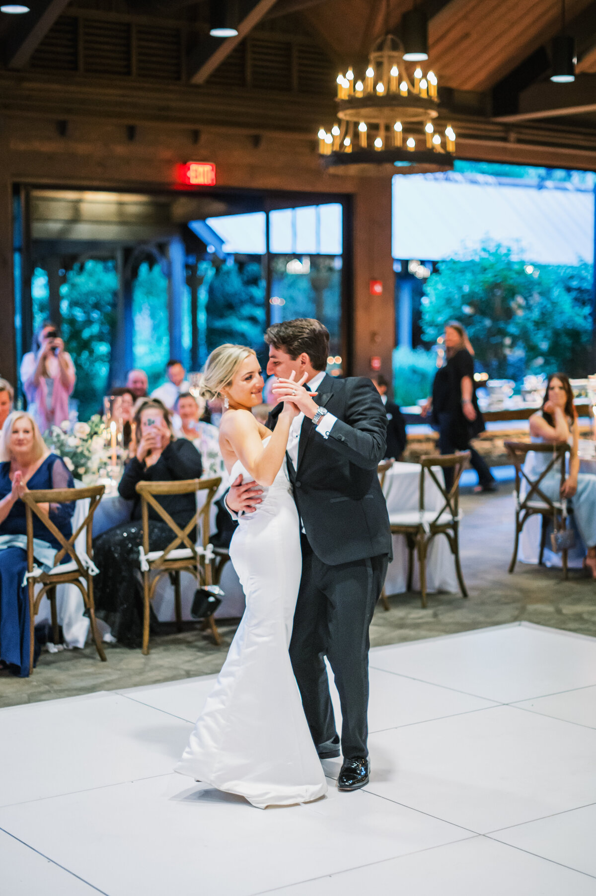 Bride and groom sharing their first dance during the reception at Old Edwards Inn in Highlands, North Carolina.