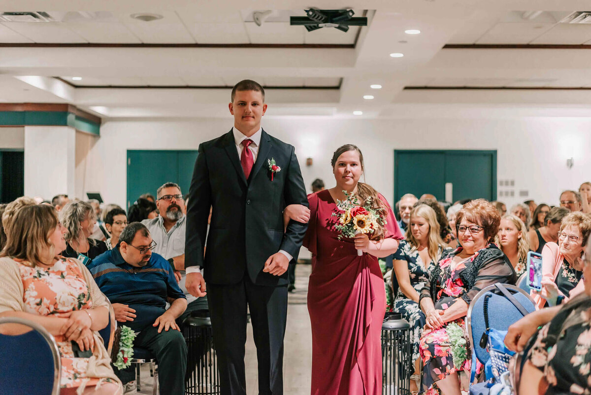 Bridal party walking down the aisle.
