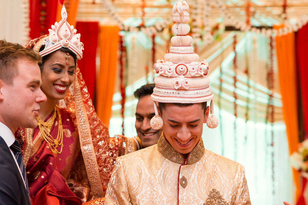 groom during ceremony at Huntington Hilton