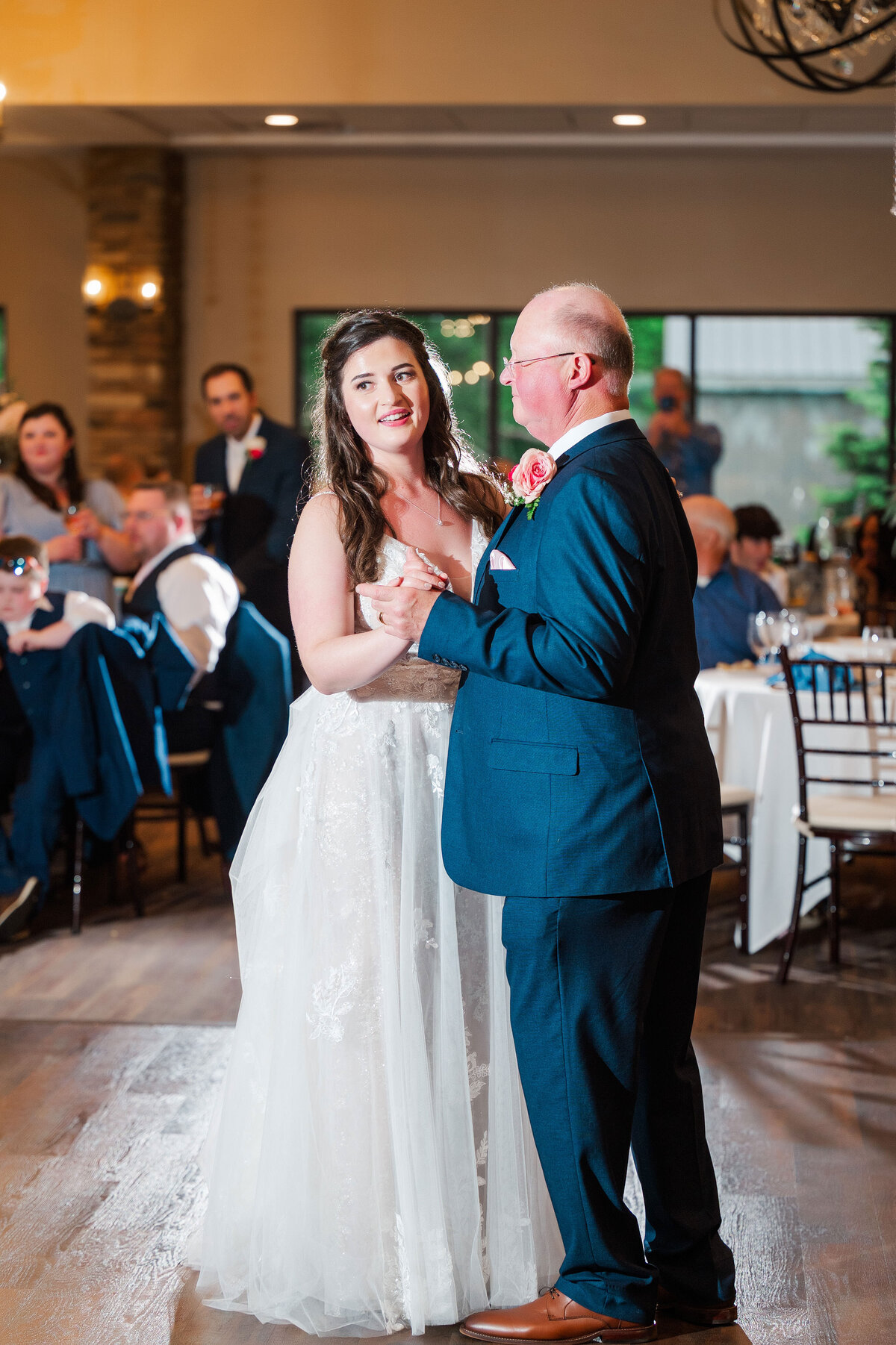 bride and dad dancing during wedding reception at vineyards at pine lake