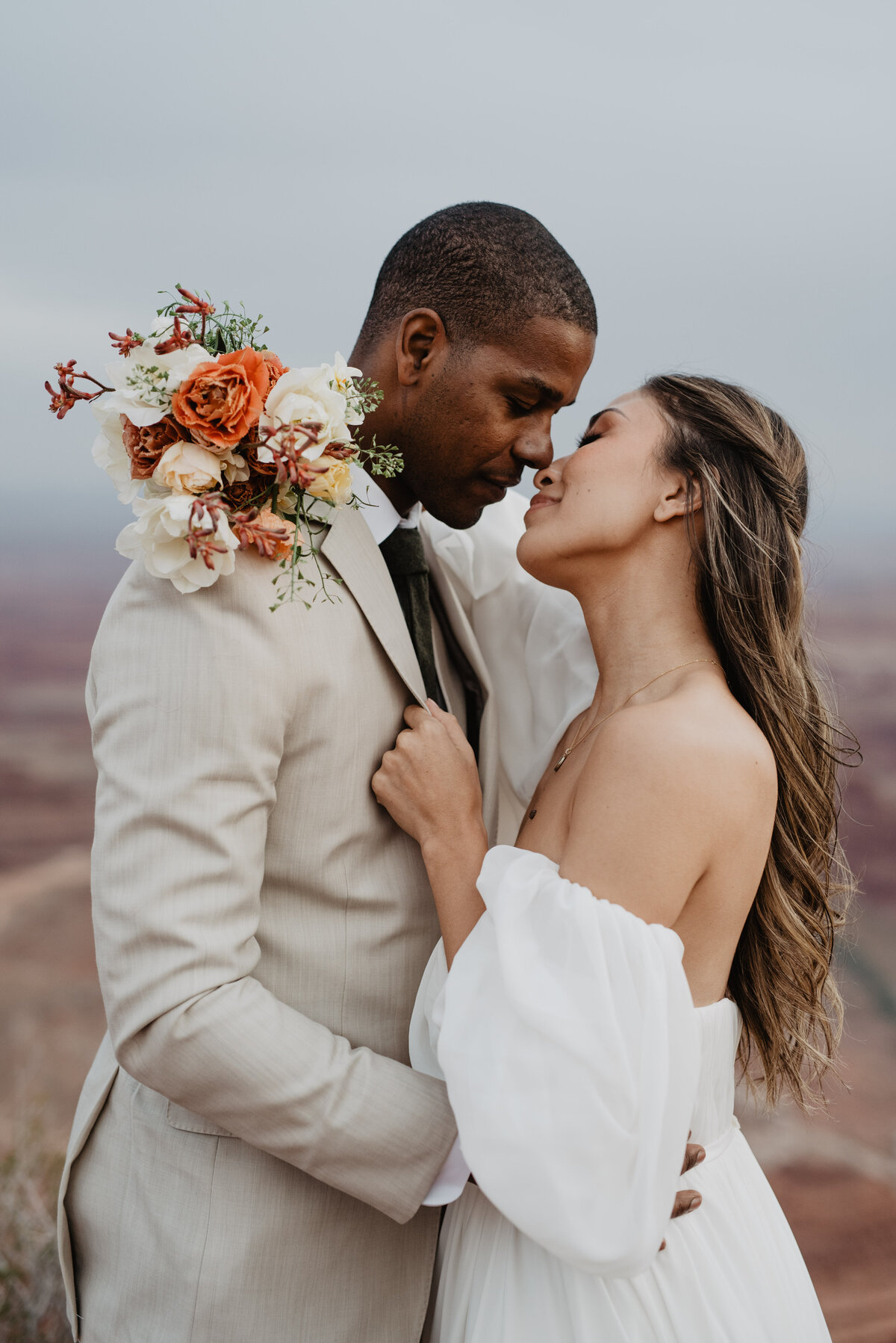 Utah Elopement Photographer captures bride touching groom's nose