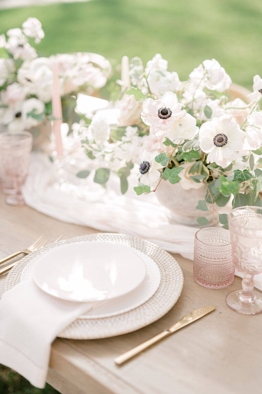 wedding reception tablescape that is blush and white