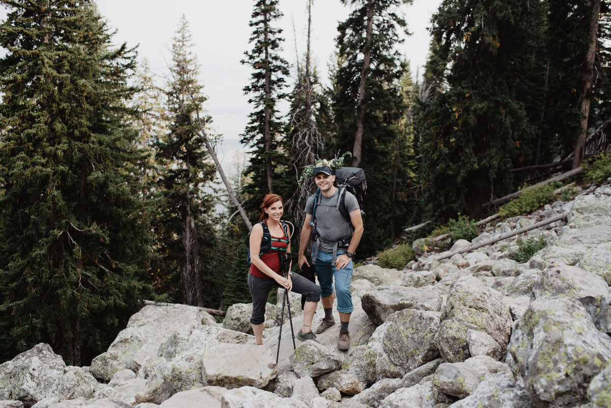 Jackson Hole photographers capture couple standing on rocks together