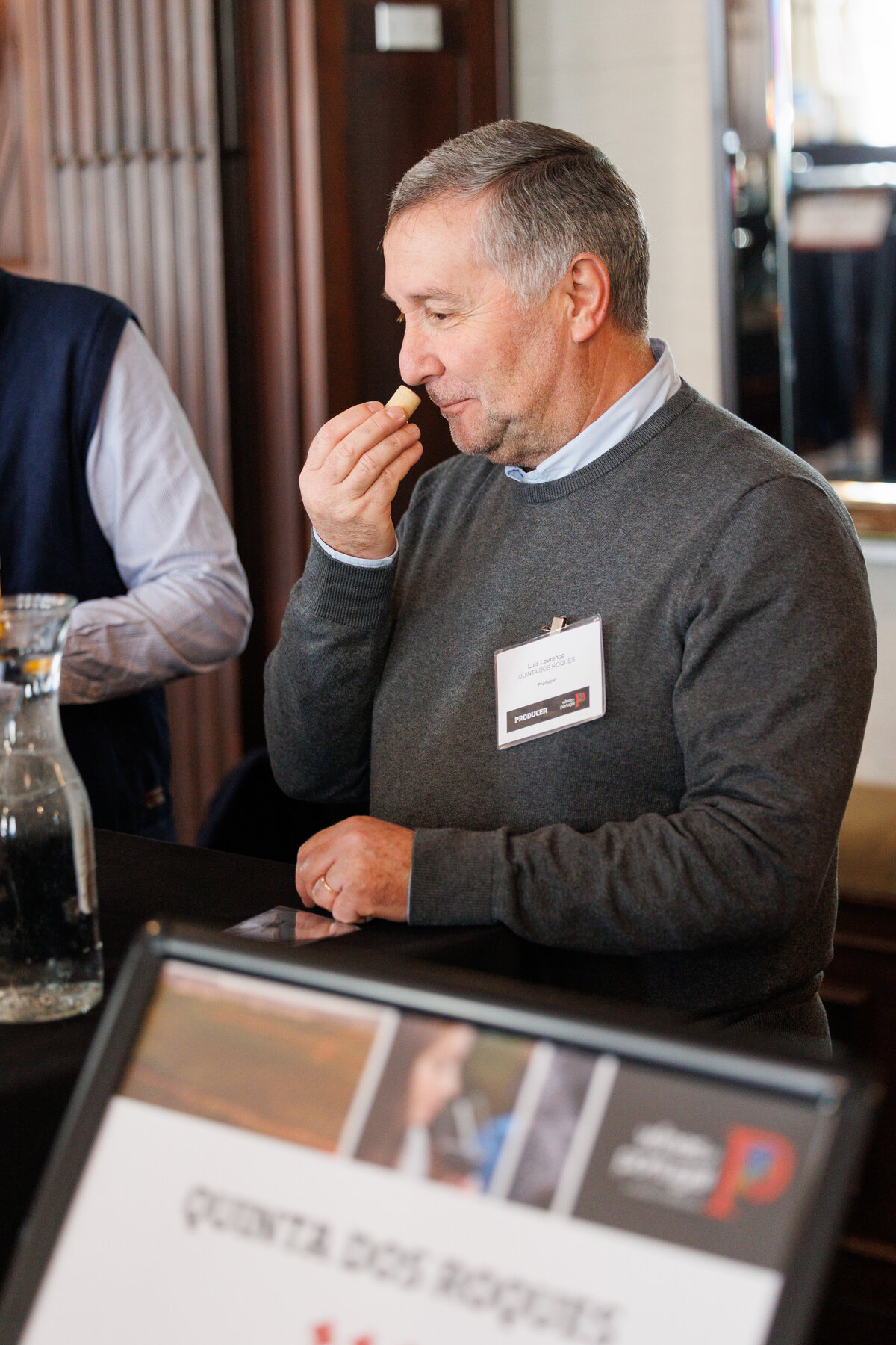 Man sniffing a cork