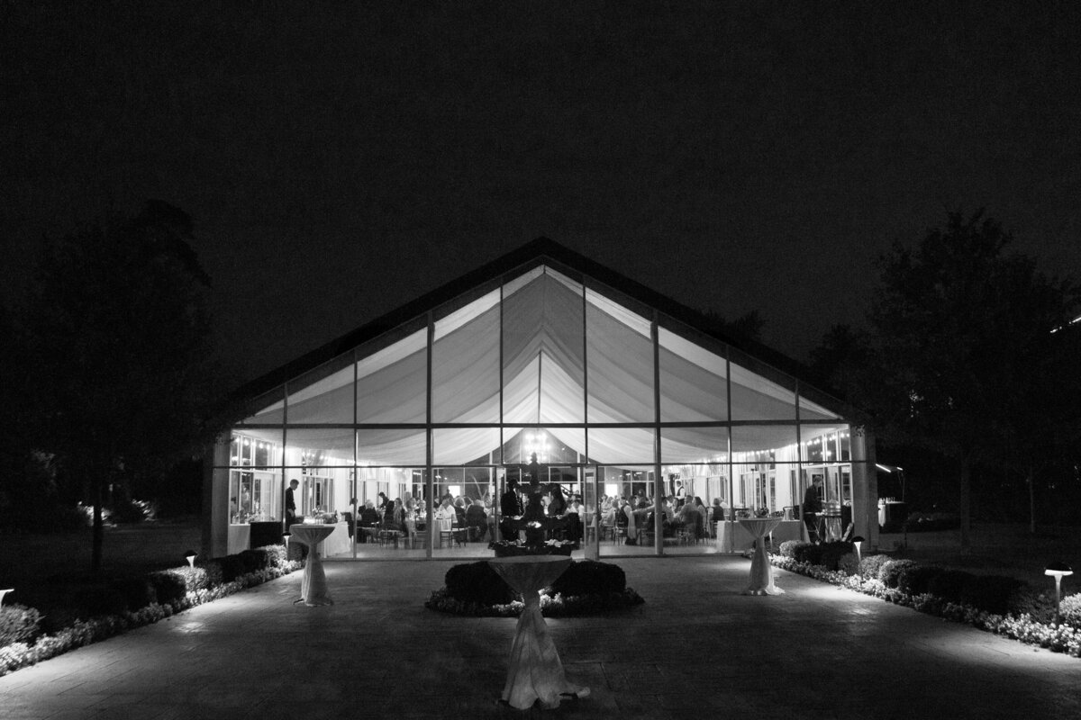Indiana wedding reception in a garden tent at night