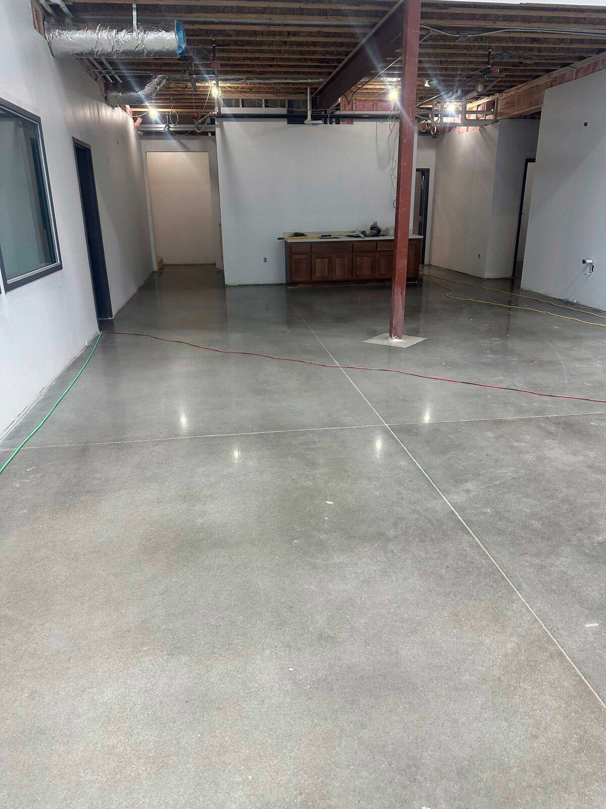 Durable and high-quality polished concrete flooring for warehouses in DFW, providing long-lasting and easy-to-maintain surfaces.