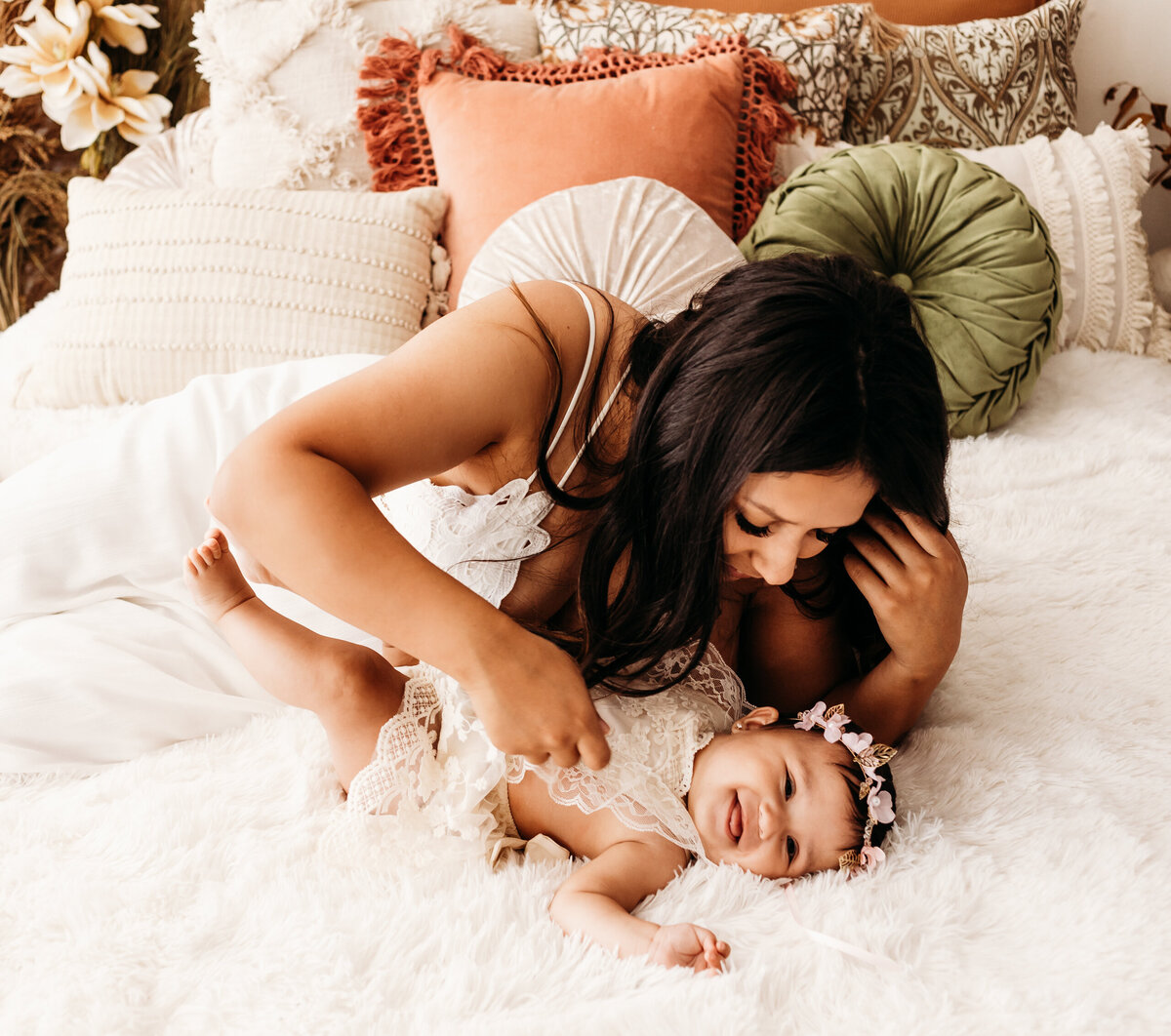 mother laying with baby