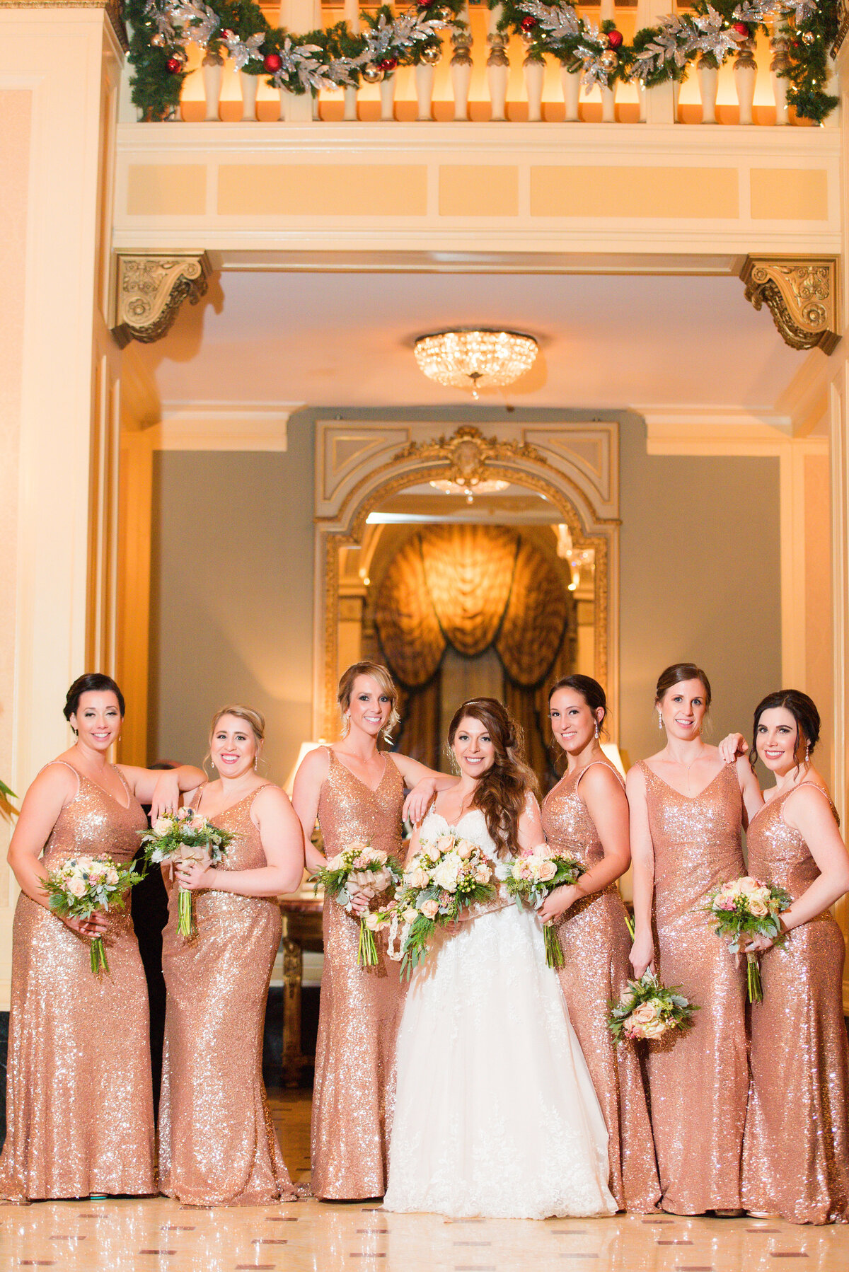 bridesmaids in omni lobby in sequins dresses