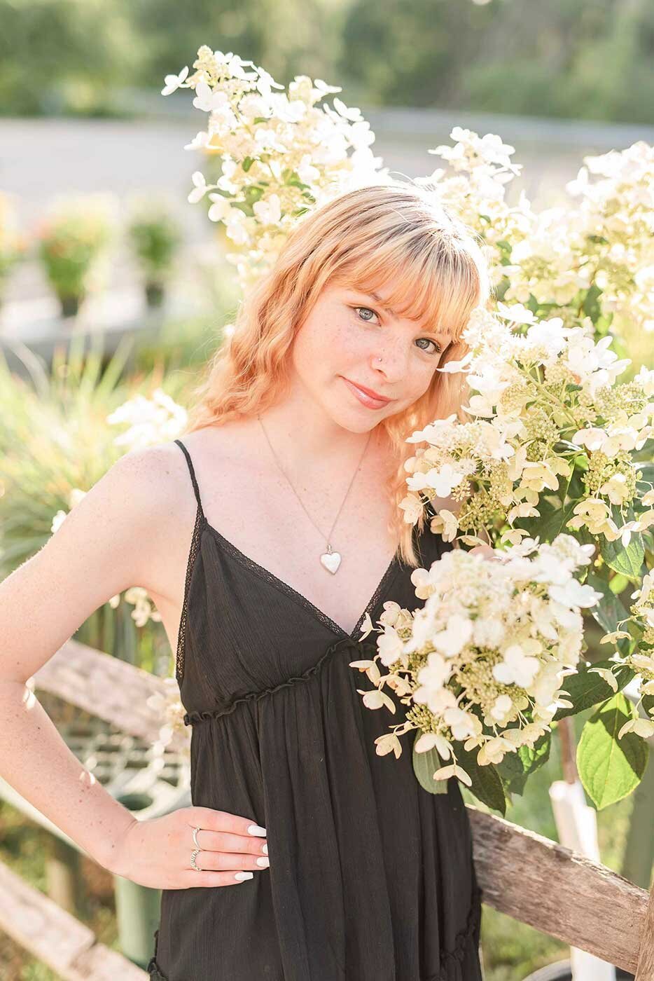 Blonde Girl in black sun dress