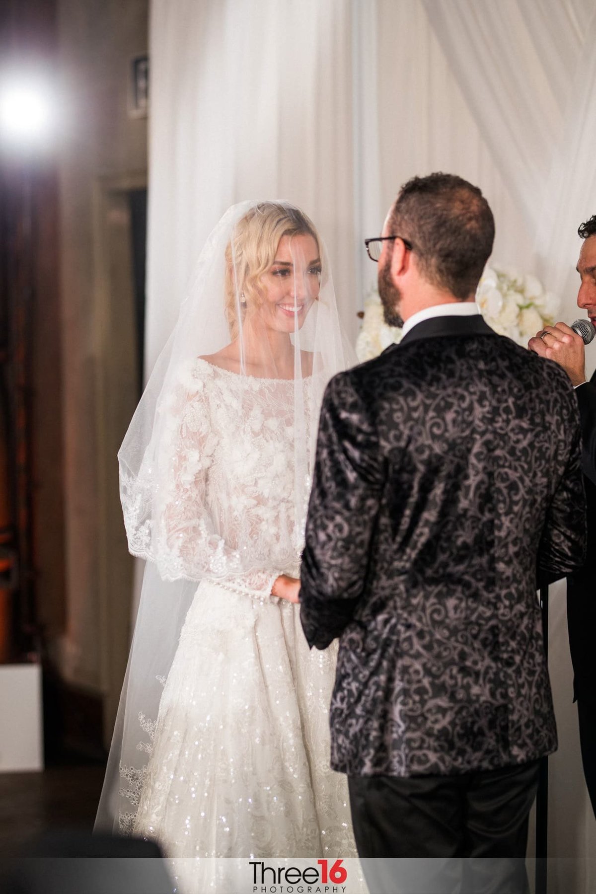 Bride and Groom take their vows together