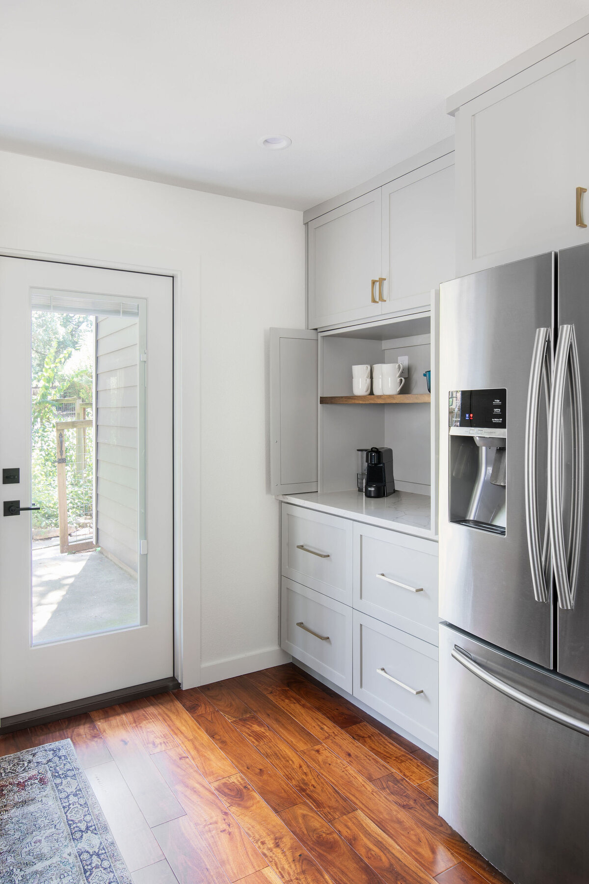 hello-home-two-tone-cabinets-kitchen-remodel-hardwood-flooring-appliance-garage-austin-11