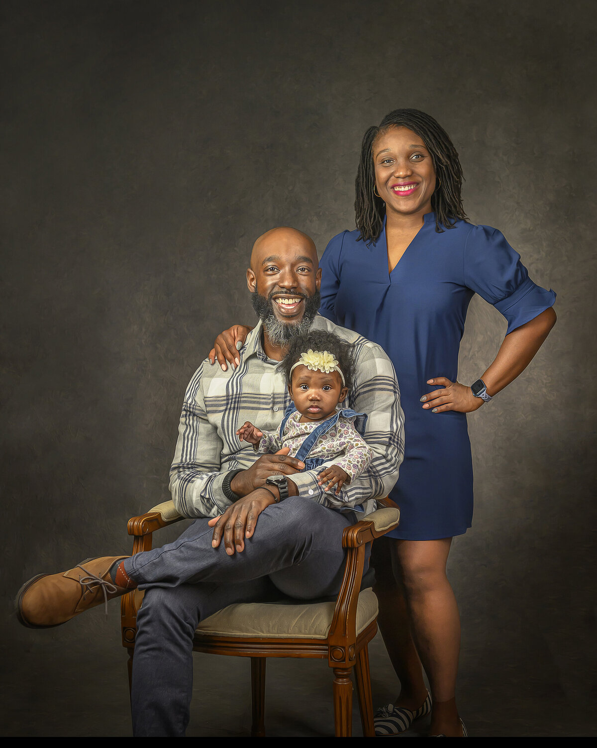 family with baby portrait in baldino studios