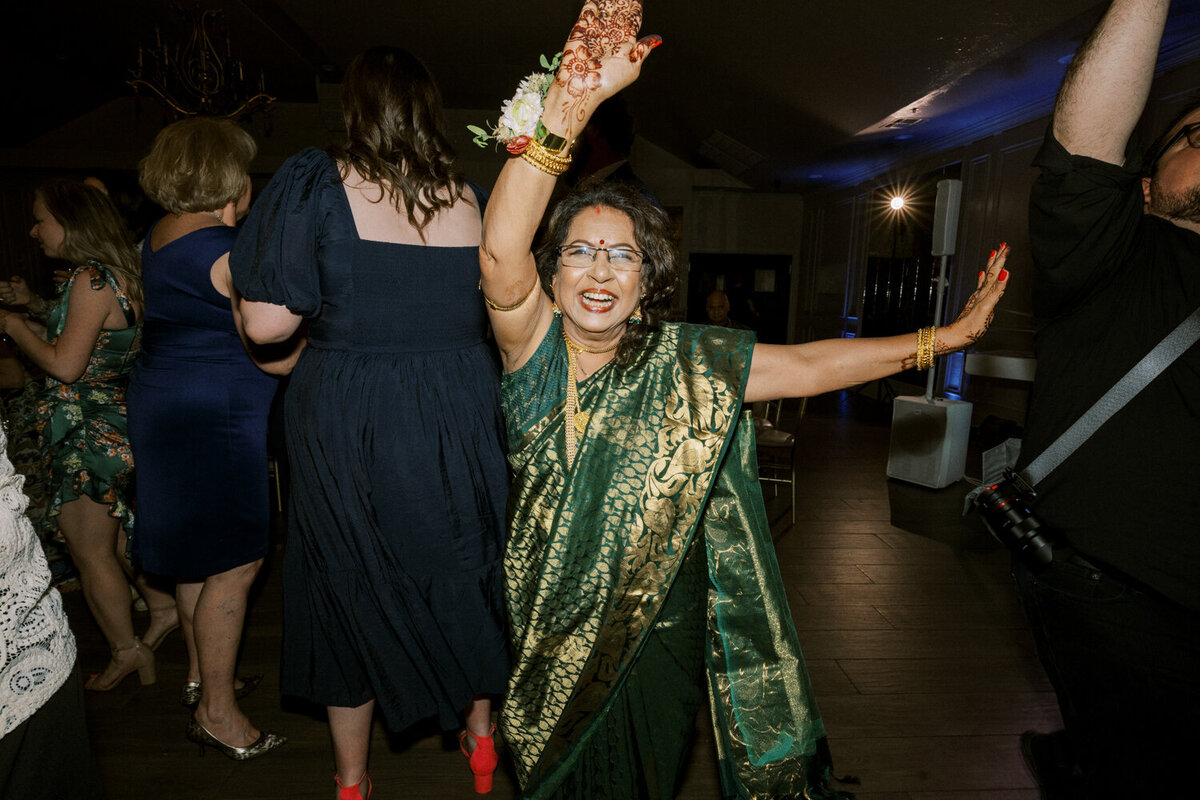 indian-woman-dancing-in-green-sari