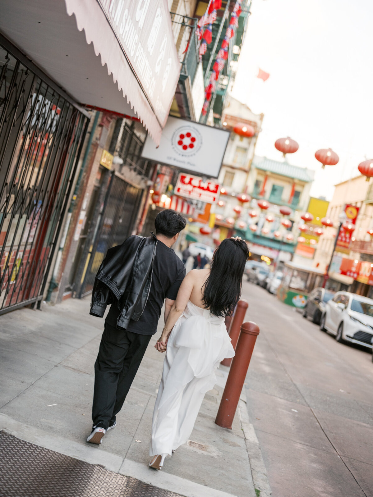 Black leather jacket white dress engagement fashion San Francisco street style