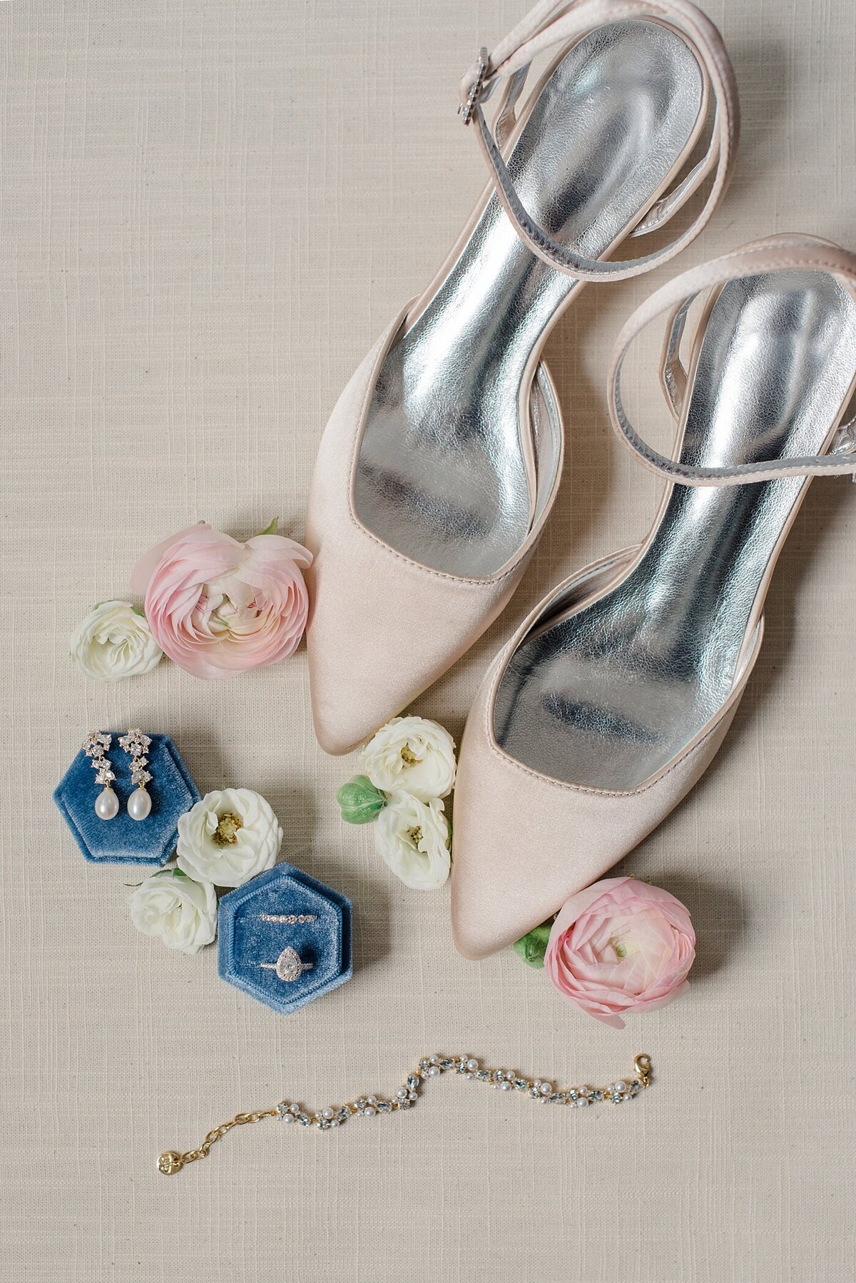 Ohio Wedding Photographer styled wedding shoes and rings at Ohio wedding in downtown Columbus, Ohio