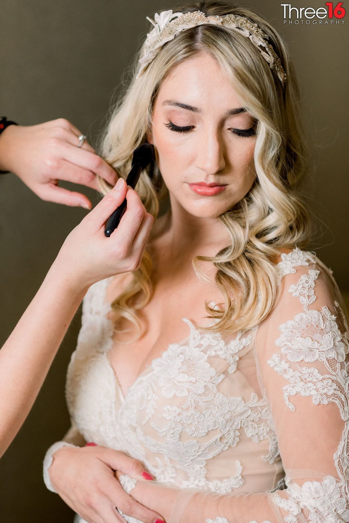 Final touches on the Bride's hair prior to the wedding ceremony