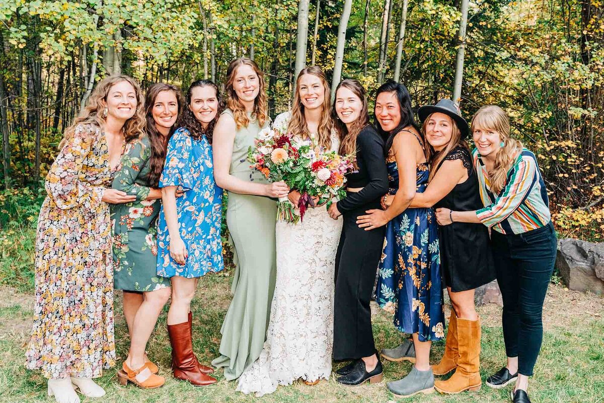 Photo of bride with friends at Izaak Walton Inn in Essex, Montana