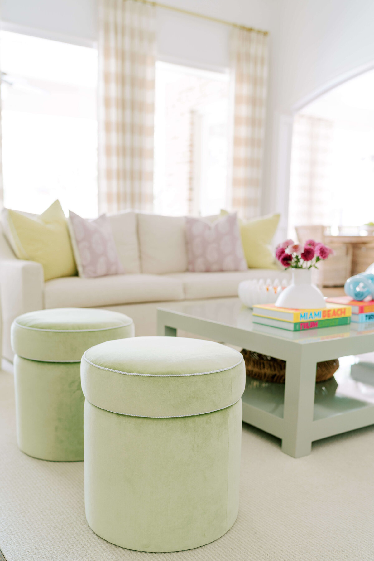 oyster creek studios hause green ottomon and ivory sofa with green coffee table living room