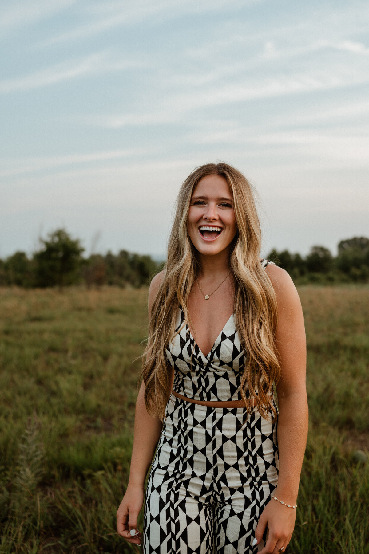 Girl laughing wearing fun outfit