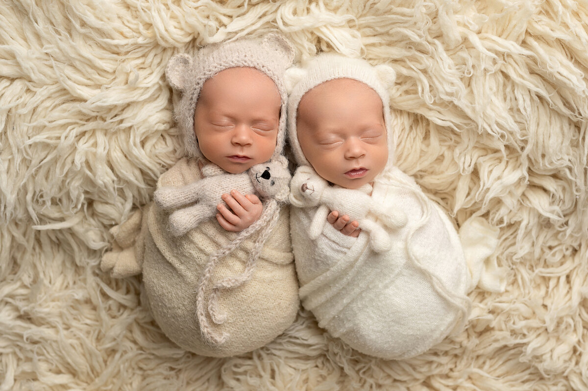 Adorable twin newborn photo session in Houston with matching outfits