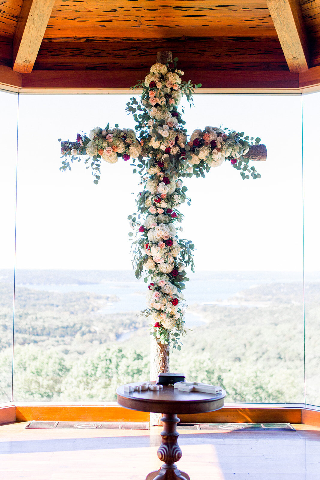 a cross decorated with flowers