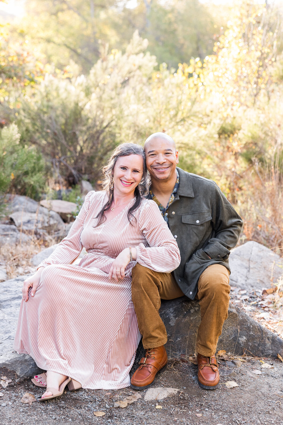 couple sitting on rock mission trails san diego